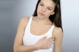 Перед менструацией болит грудь