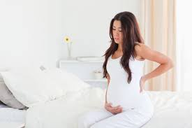 Боль в спине при беременности вызваны изменениями происходящими в организме женщины