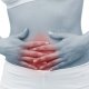 Болит желудок во время месячных: причины и лечение
